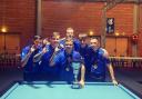 The Scottish under 23 team celebrate with the trophy following their triumph.