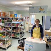 Food larder volunteer Dawn is happy to help the community