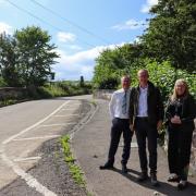UK Government Minister for Scotland John Lamont (centre) viewed upgrade plans for the B714 road between Dalry and Saltcoats during a visit to the west coast of Scotland.