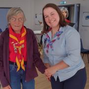 Elizabeth is awarded the 60 Year Long Service Award by County Commissioner Louise Crichton