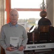 Author Alex with his new book