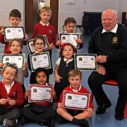 West Kilbride Primary Burns winners P1-3 winners with Hunterston Rotary Club's Jim Jackson