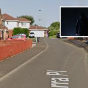 Residents of Barra Place have urged caution after a man was seen acting suspiciously in the area.