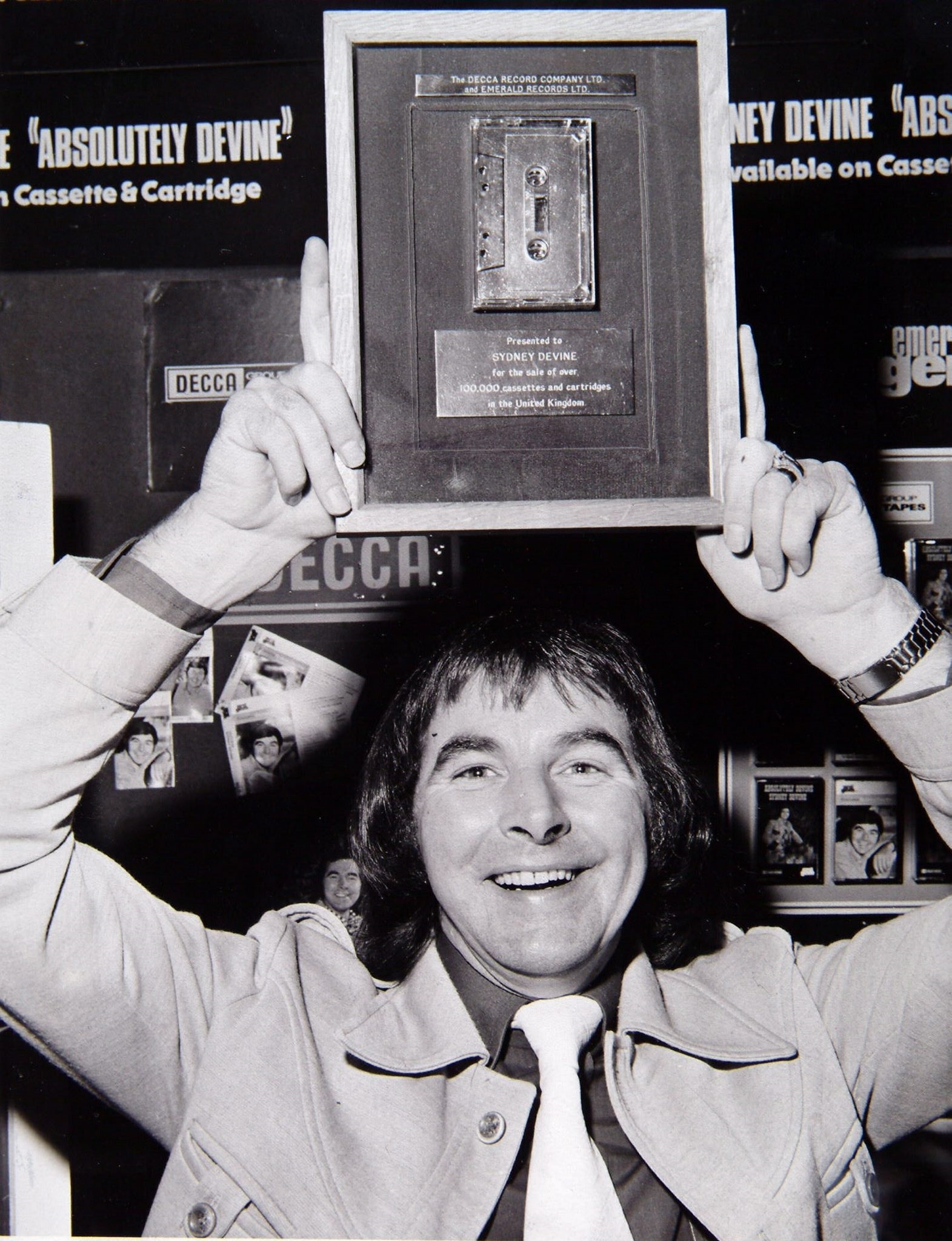 SINGER SYDNEY DEVINE WITH HIS GOLD CASSETTE. 1975. Pic: Herald and Times