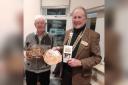 Donald Mclarty, (left) chairman of the Three Towns and District Men’s Shed with Hunterston Rotary President Gib Fitzgibbon and some of the items made by the Men’s Shed team.