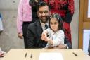 Humza Yousaf and daughter Amal, 3 as he signs his nomination form for first minister