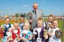 Ardrossan Highland Games 2013 Chieftain Stephen McAllister with some of the dance winners