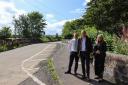 UK Government Minister for Scotland John Lamont (centre) viewed upgrade plans for the B714 road between Dalry and Saltcoats during a visit to the west coast of Scotland.