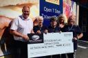 Keiran Gillan of Fife Creamery presents the cheque to the Whitlees Centre team alongside Lorraine Nixon of Keystore Ardrossan.