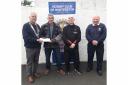 John Deans and Andrew Barclay from the Shibumi Karate Club in Saltcoats who received their award from then Hunterston Rotary Club President Derek Andrews (left) and Community Convenor Jim Jackson.