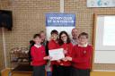 The winning West Kilbride team collect their certificate