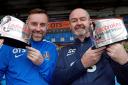 DOUBLE CELEBRATION: Ladbrokes Premiership Player of the  Month Kris Boyd is pictured with Manager of the Month Steve Clark at Rugby Park on Monday.