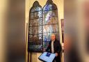 Andrew Russell with the stained glass window now on show at the North Ayrshire Heritage Centre in Saltcoats - gifted to the former St John's Church by Andrew's great-great-grandfather, Joseph Russell