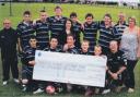 Ardrossan Accies youth players received a cheque from  the Hunterston A team
