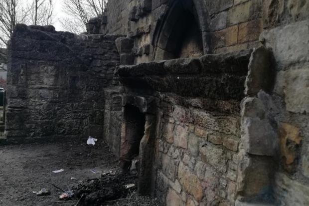 The damaged stonework caused by the bin fire