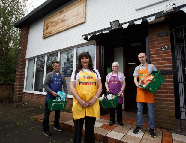 Ardrossan and Saltcoats Herald: Pollok Pantry manager Tracy Galligan, second from left pictured with volunteers, from left - Grant McMillan, Tracy, Julia Allan and Darren Montgomery
