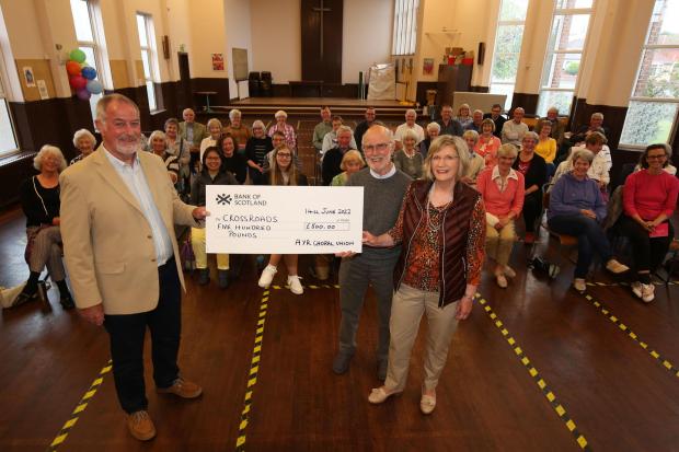 Ayr Choral Union, Castlehill Chirch, Ayr AGM present a cheque for £500 to Brian Kelsey of Crossroads caring Scotland
Left to right : Brian Kelsey, David Reader ( Ayr Choral Union ) and Linda Somerville ( Ayr Choral Union Marketing Manager )
