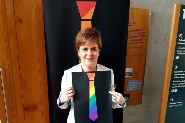 First Minister Nicola Sturgeon, pictured in 2017, supporting the 'tie' campaign (Time for Inclusive Education), but actual ties are being discouraged in Spain during the heatwave