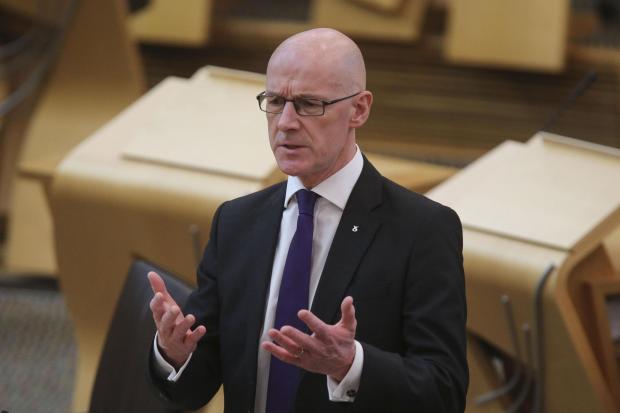 Deputy First Minister John Swinney urged councils to do more to avoid strike action