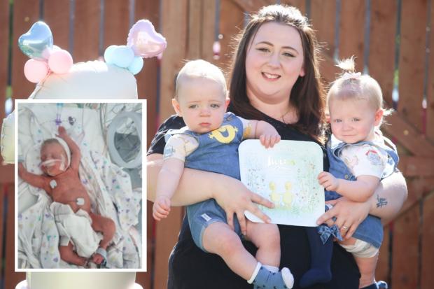 Mum emotional as 'little warrior' twins defy odds by turning one after traumatic birth