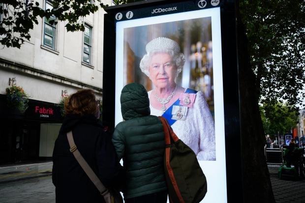 The late Queen's portrait on electronic billboard
