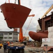 The 100-tonne block lift of the bow to be connected onto Hull 802, in the Ferguson Marine shipyard, in Port Glasgow, Scotland, 26 April 2022. .