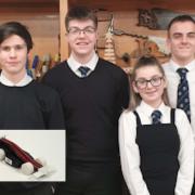 The successful pupils and their car design (inset).