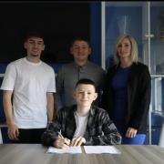 Harvey Gilmour signed his first professional contract with Kilmarnock, alongside his family, around this time last year