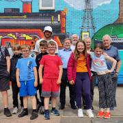 Local kids, members of the Ardrossan Community Development Trust and Tragic O'Hara were overjoyed to see the mural completed.