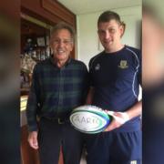 Ian Murchie (left) presenting the match ball to then Accies captain Stuart Lamont before a game in 2016.