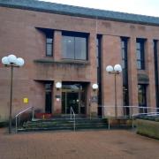 Michael Fisher was jailed at Kilmarnock Sheriff Court after the assault in Court 1