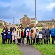 Pupils from St Anthony's Primary (red uniform) and Dykesmains Primary in Saltcoats prepare to Beat the Street with Councillor Tony Gurney