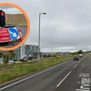 Temporary lights will remain on the Shore Road for a sixth month.