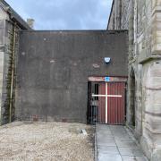 The lean-to wall connecting Barony St John Centre to the former Barony Church