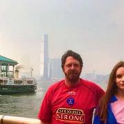 KILLIE CAMPAIGN: Stephen Hammill with his daughter Rhianna at Victoria Harbour in Hong Kong.