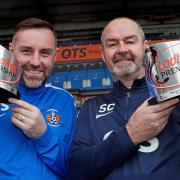 DOUBLE CELEBRATION: Ladbrokes Premiership Player of the  Month Kris Boyd is pictured with Manager of the Month Steve Clark at Rugby Park on Monday.