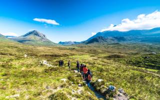 How does the 'right to roam' in Scotland differ from the law in England?