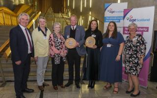 The group alongside host Kenneth Gibson MSP at the awards.