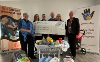 Garnock Valley helping Hands receive the donation from Persimmon