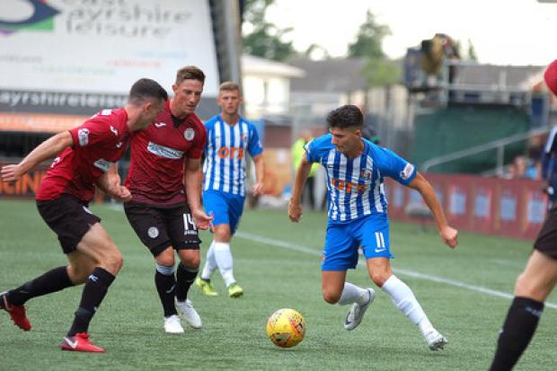 WELL PLAYED: Killie win this challenge. Picture: Ross Mackenzie
